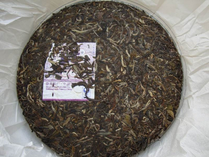 2009 DaYi "69 Zhou Nian Chang Qing" (69th Birthday of Menghai Tea Factory) Cake 357g Puerh Sheng Cha Raw Tea