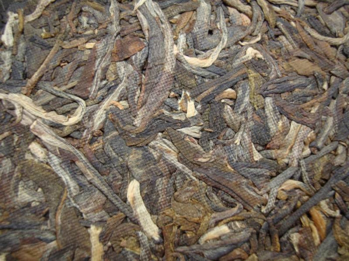 2009 DaYi "69 Zhou Nian Chang Qing" (69th Birthday of Menghai Tea Factory) Cake 357g Puerh Sheng Cha Raw Tea