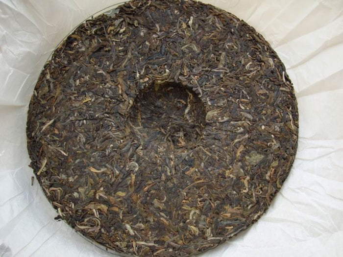 2009 DaYi "69 Zhou Nian Chang Qing" (69th Birthday of Menghai Tea Factory) Cake 357g Puerh Sheng Cha Raw Tea