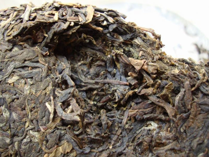 2009 DaYi "69 Zhou Nian Chang Qing" (69th Birthday of Menghai Tea Factory) Cake 357g Puerh Sheng Cha Raw Tea