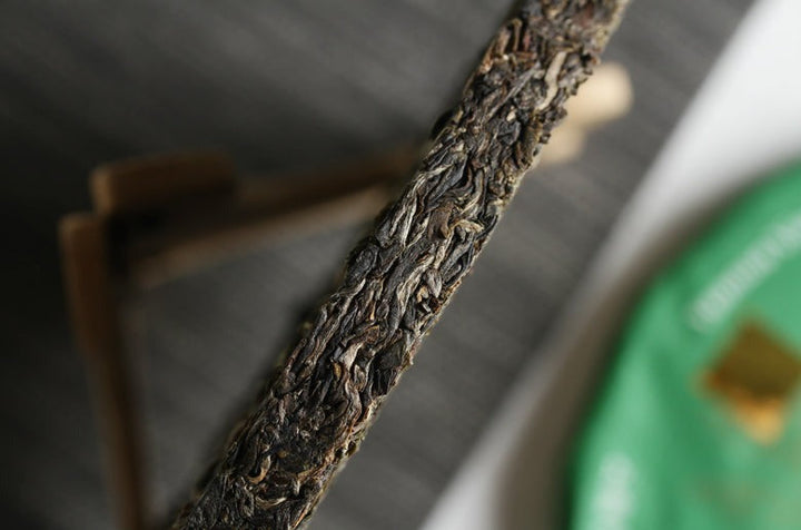 2017 XiaGuan "Dong Fang Zhi Zhu - Bu Lang Gu Shu" (Oriental Pearl - Bulang Old Tree) Iron Cake 357g Puerh Sheng Cha Raw Tea