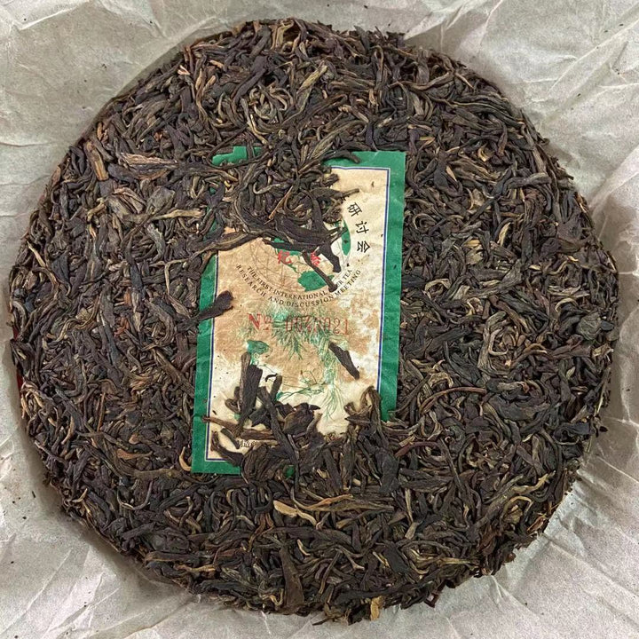 2002 TaiLian "Ji Nian" (Commemoration of 2002 International Puer Tea Seminar) Cake 400g Puerh Sheng Cha Raw Tea
