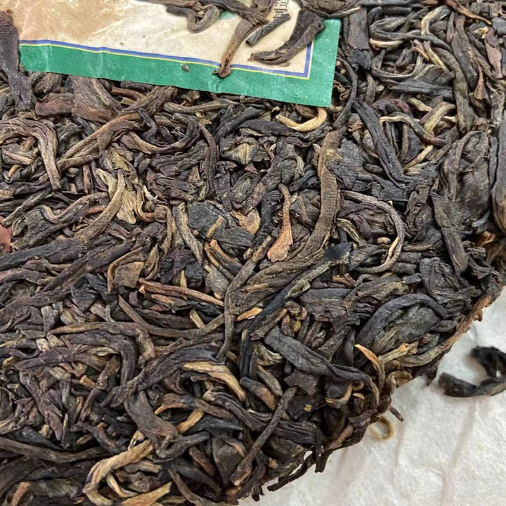 2002 TaiLian "Ji Nian" (Commemoration of 2002 International Puer Tea Seminar) Cake 400g Puerh Sheng Cha Raw Tea