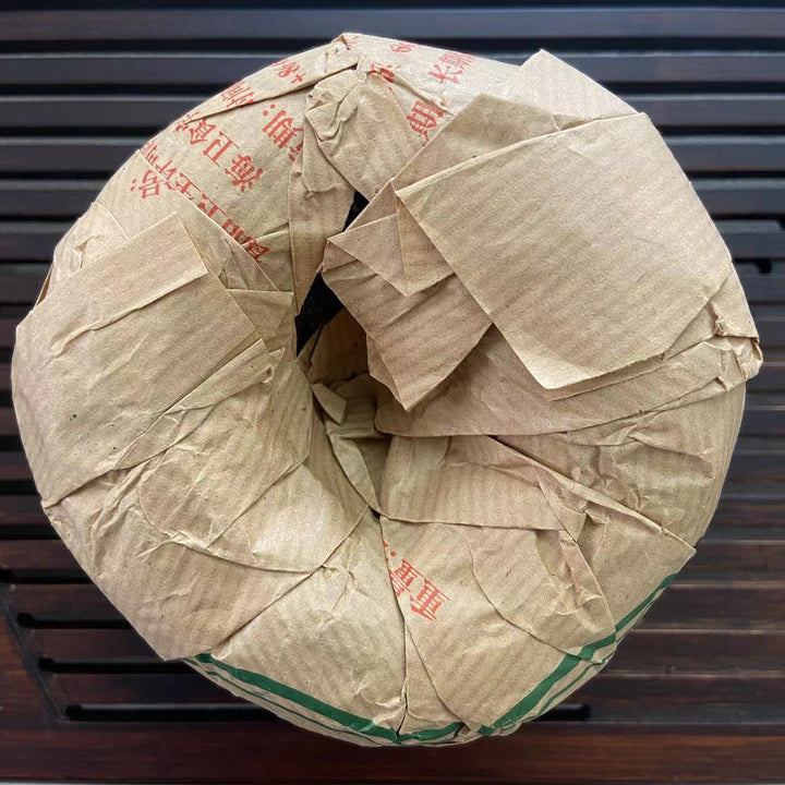 2005 DaYi "V93" (1st Batch 501 - Ten Years Sharpen One Sword) Tuo 250g Puerh Shou Cha Ripe Tea