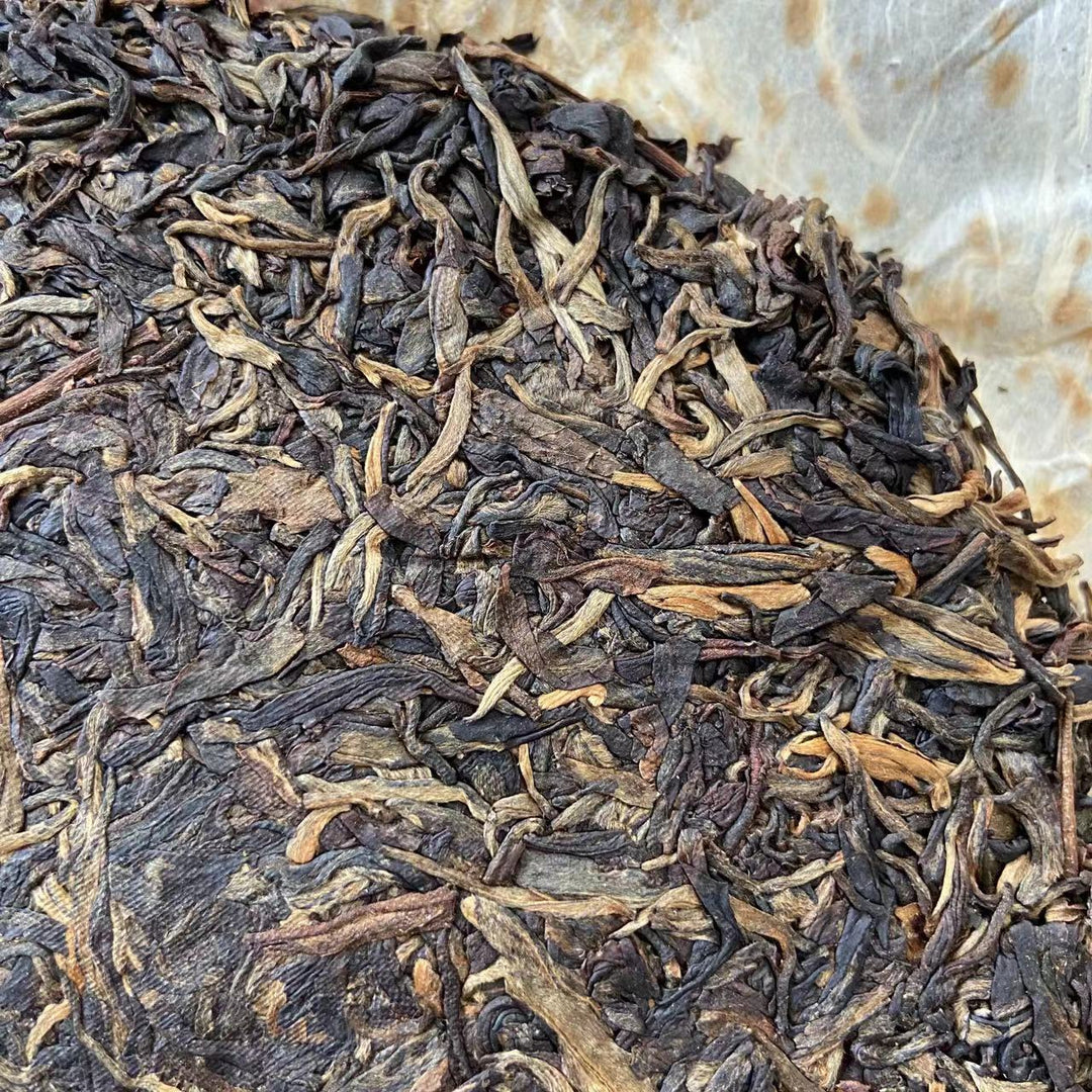2007 LiMing "Bu Lang Shan - Qiao Mu Gu Shu - Nv Er Gong Bing" (Bulang Mountain - Ancient Arbor Tree) Cake 357g Puerh Raw Tea Sheng Cha