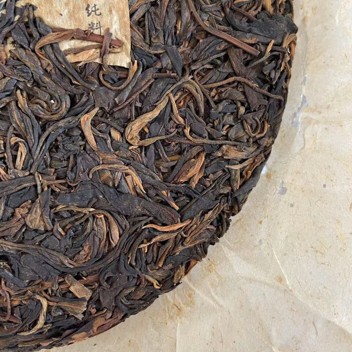 2004 TMK "Ma Hei - Qiao Mu Gu Shu - Yi Wu" (Mahei - Old Arbor Tree - Yiwu) Cake 400g Puerh Raw Tea Sheng Cha
