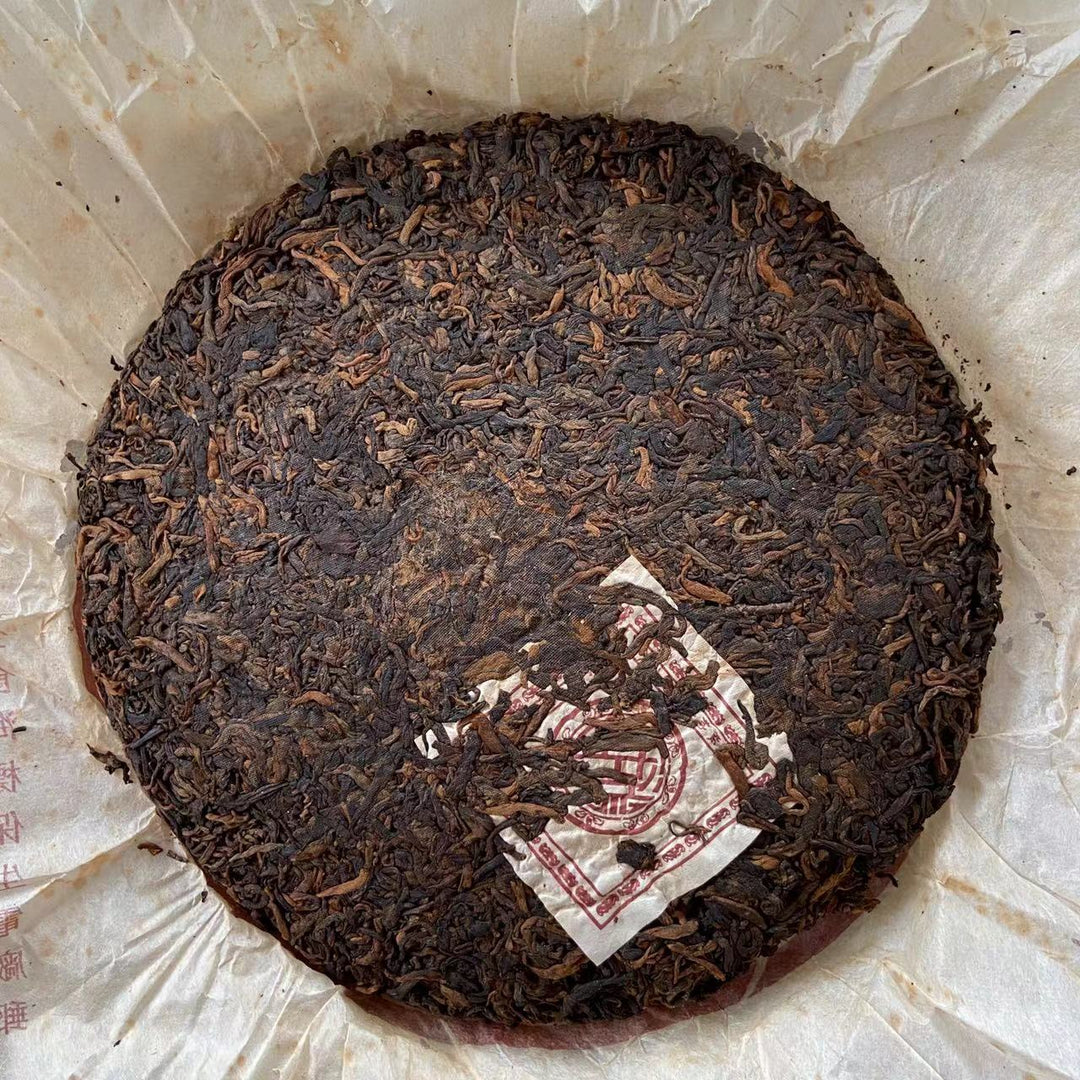 2004 XingHai "Yi Wu" (Yiwu - Old Arbor Tree) Cake 357g Puerh Ripe Tea Shou Cha