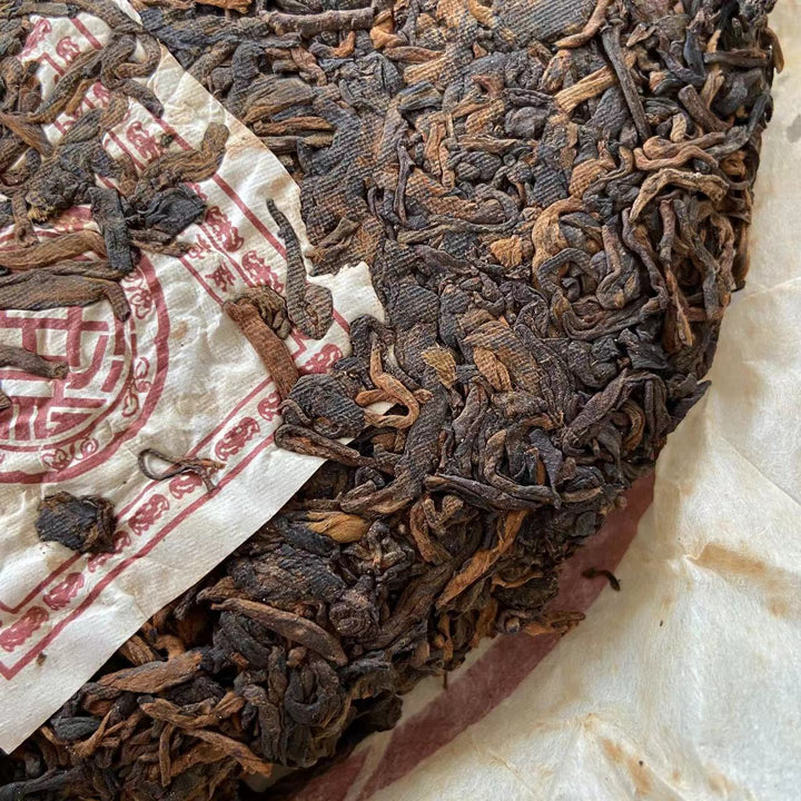 2004 XingHai "Yi Wu" (Yiwu - Old Arbor Tree) Cake 357g Puerh Ripe Tea Shou Cha