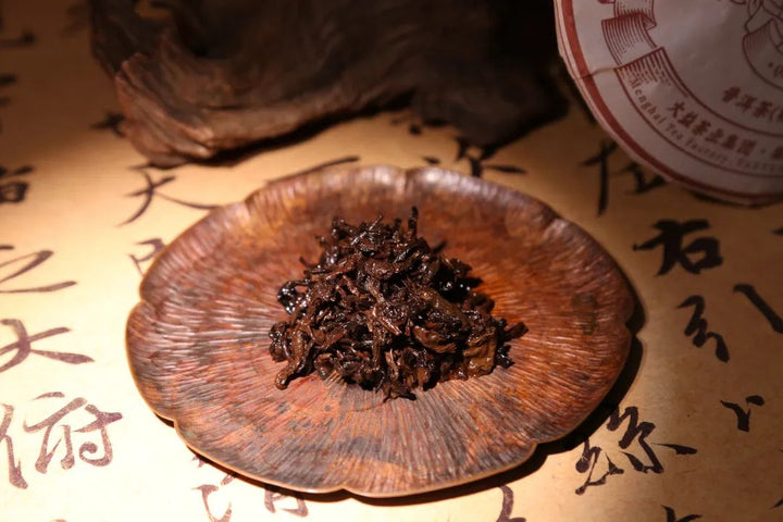 2024 DaYi "Qi Zi Zhi Ge" (The Song of the Seven Sons) Cake 1st Batch 357g Puerh Shou / Shu Cha Ripe Tea