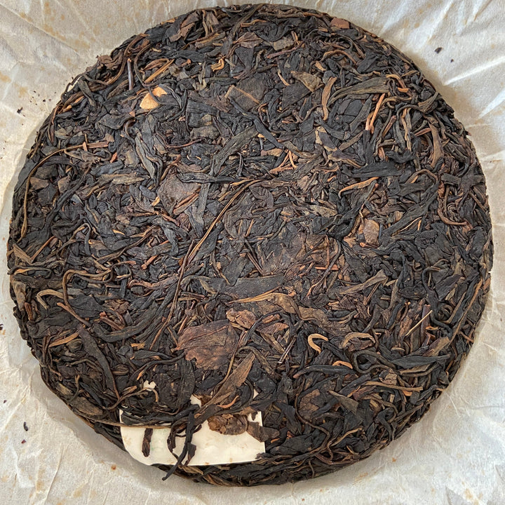 2007 YiPinTang "Yi Wu Zhi Chun" (Spring of Yiwu) Cake 357g Puerh Raw Tea Sheng Cha