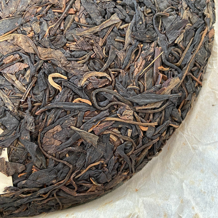 2007 YiPinTang "Yi Wu Zhi Chun" (Spring of Yiwu) Cake 357g Puerh Raw Tea Sheng Cha