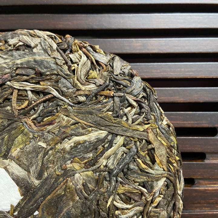 2023 TMK Spring "Xi Niu Tang" (Xiniutang) Big Tree 100g Cake Puerh Sheng Cha Raw Tea