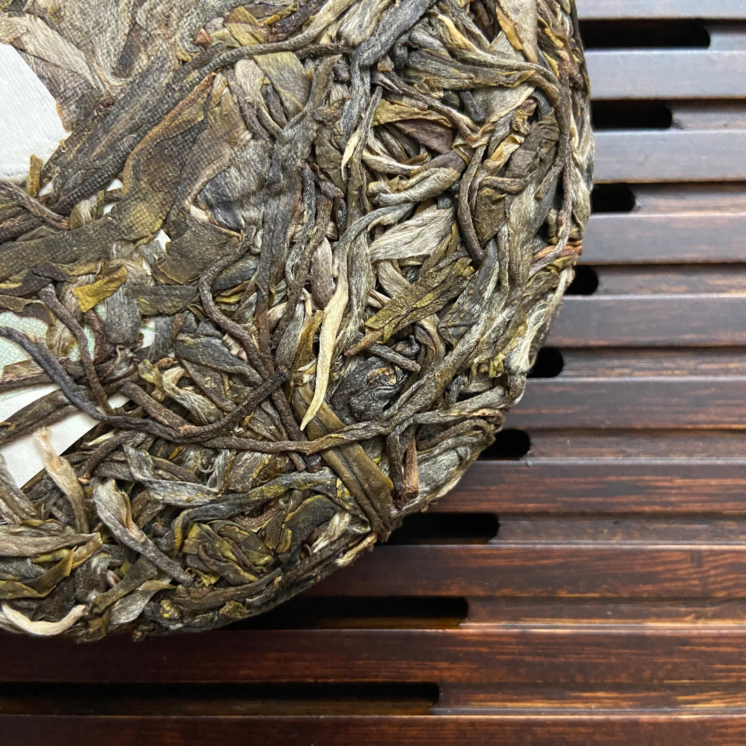 2023 TMK Spring "Xi Niu Tang" (Xiniutang) Big Tree 100g Cake Puerh Sheng Cha Raw Tea