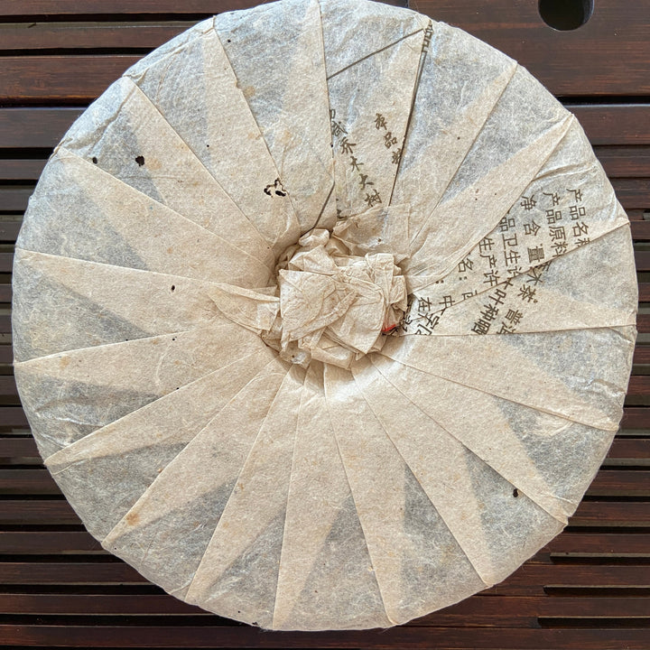 2012 TianPu "Yi Wu - Qiao Mu" (Yiwu - Arbor Tree) Cake 357g Puerh Raw Tea Sheng Cha