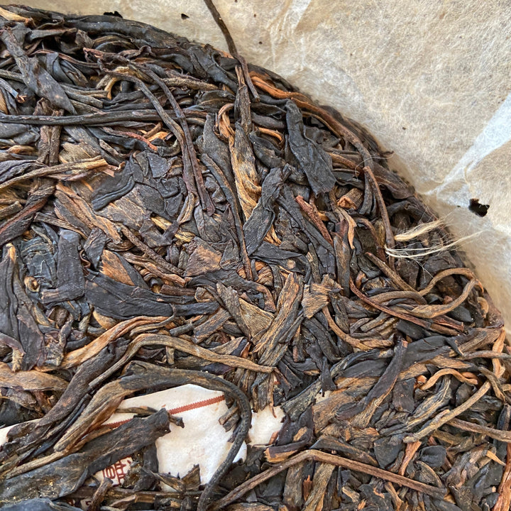 2012 TianPu "Yi Wu - Qiao Mu" (Yiwu - Arbor Tree) Cake 357g Puerh Raw Tea Sheng Cha