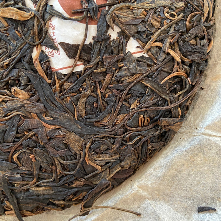 2012 TianPu "Yi Wu - Qiao Mu" (Yiwu - Arbor Tree) Cake 357g Puerh Raw Tea Sheng Cha