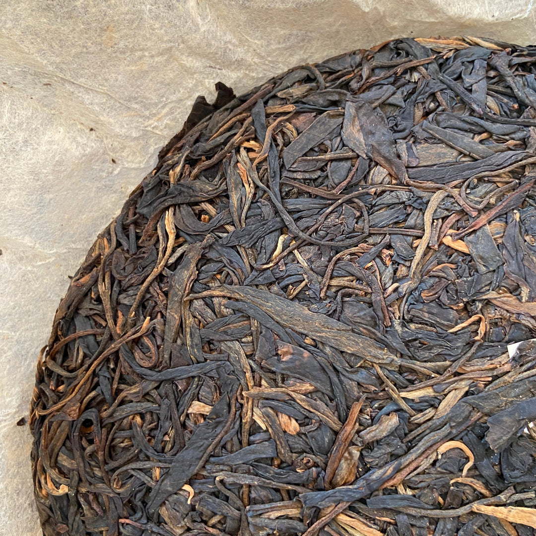 2012 TianPu "Yi Wu - Qiao Mu" (Yiwu - Arbor Tree) Cake 357g Puerh Raw Tea Sheng Cha
