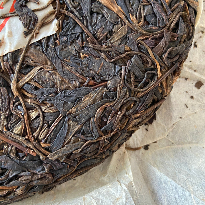 2006 JingLong "Yi Wu Zheng Shan - Qiao Mu" (Yiwu Mountain - Arbor) Cake 357g Puerh Raw Tea Sheng Cha
