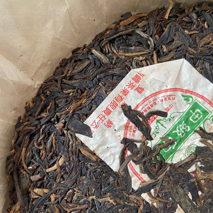 2005 NanQiao "De He Xing - Jia Ji Yin Cha" (DX - 1st Grade Mark) Cake 357g Puerh Raw Tea Sheng Cha, Meng Hai