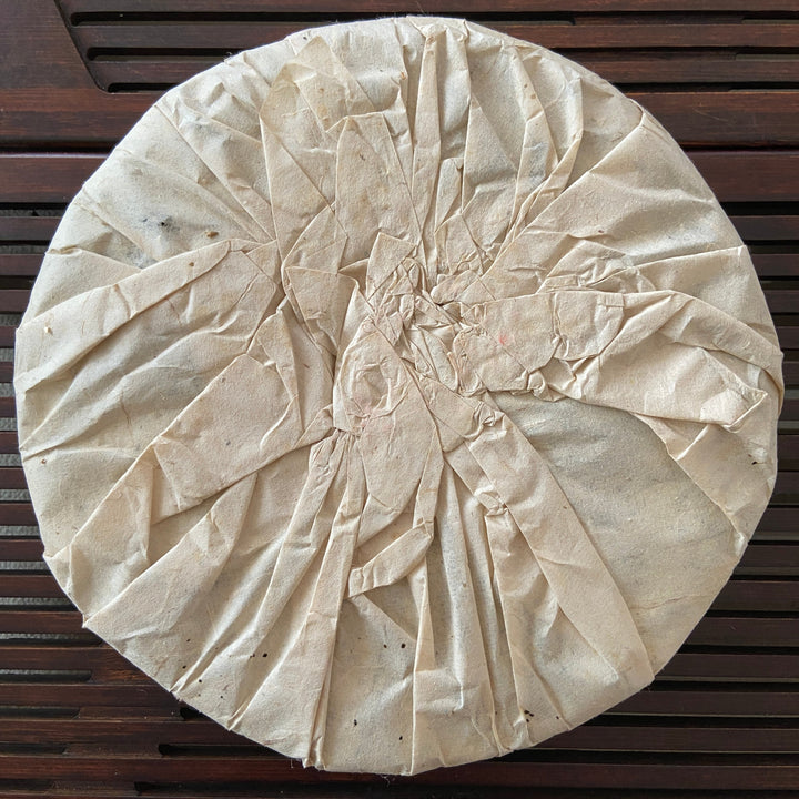 2005 JiXing "Gao Shan Qiao Mu Yu Qian" (High Mountain Arbor Tree Early Spring) Cake 400g Puerh Raw Tea Sheng Cha