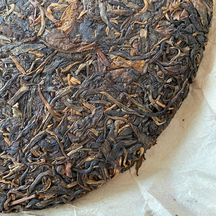 2005 JiXing "Gao Shan Qiao Mu Yu Qian" (High Mountain Arbor Tree Early Spring) Cake 400g Puerh Raw Tea Sheng Cha