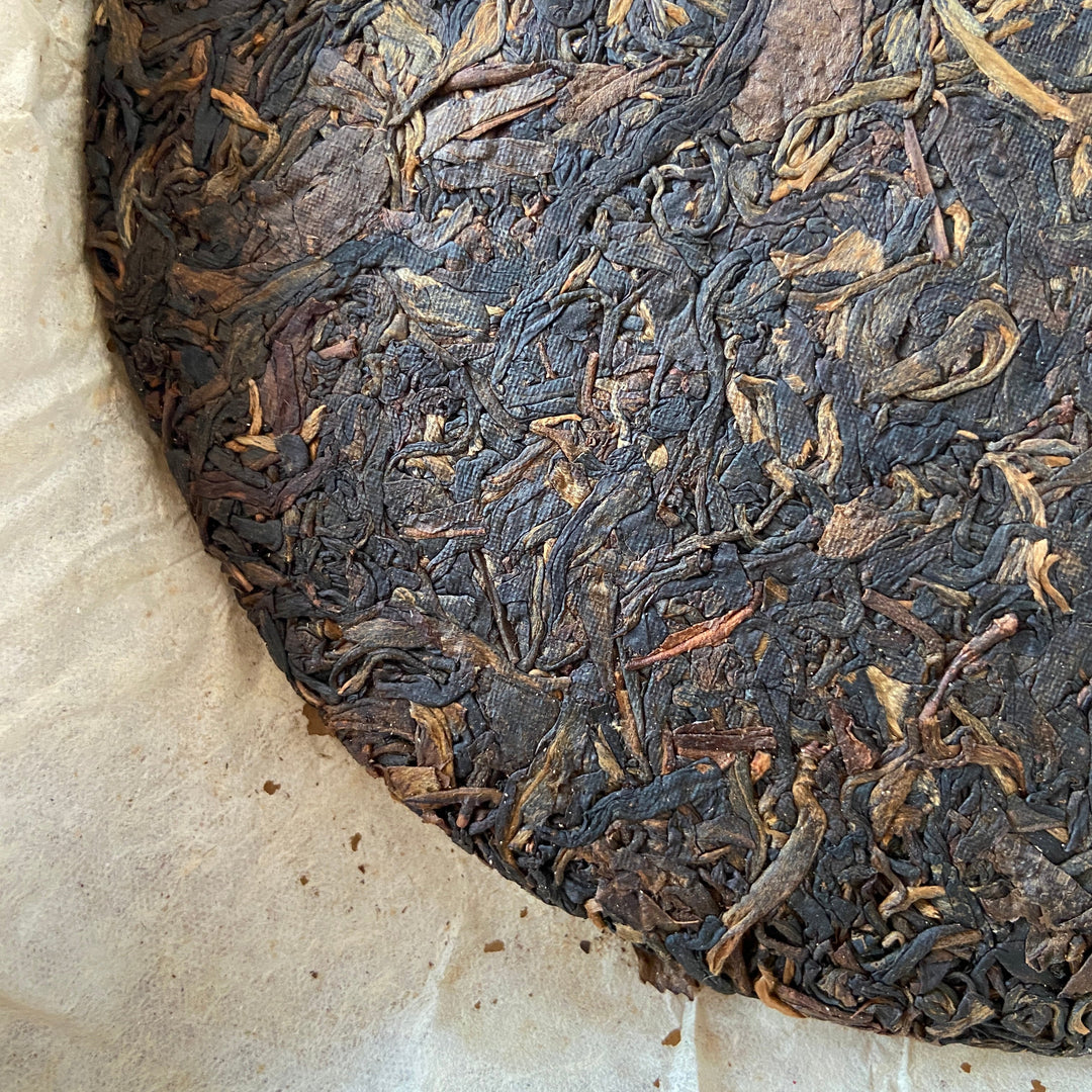2005 XingHai "Bu Lang - Mei Hua Bing" (Bulang - Plum Flower Cake) 357g Puerh Raw Tea Sheng Cha