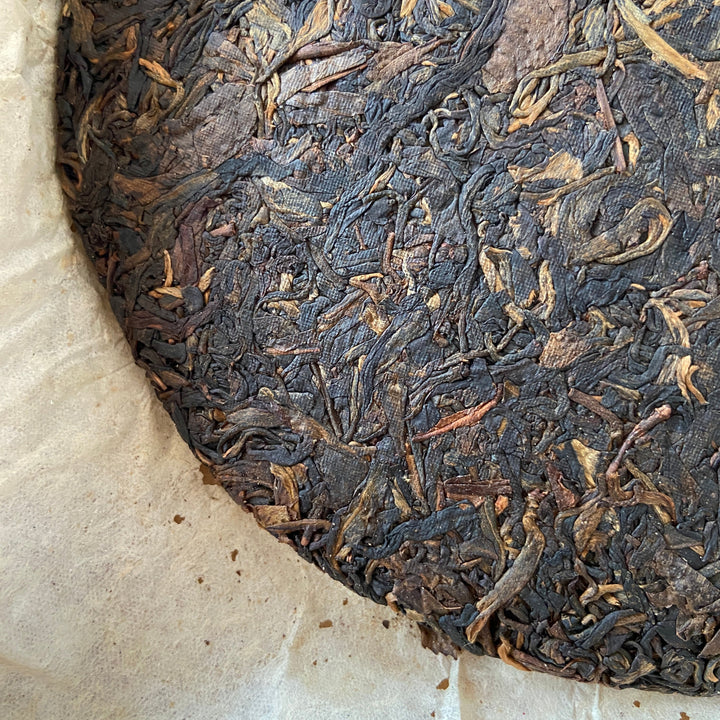 2005 XingHai "Bu Lang - Mei Hua Bing" (Bulang - Plum Flower Cake) 357g Puerh Raw Tea Sheng Cha