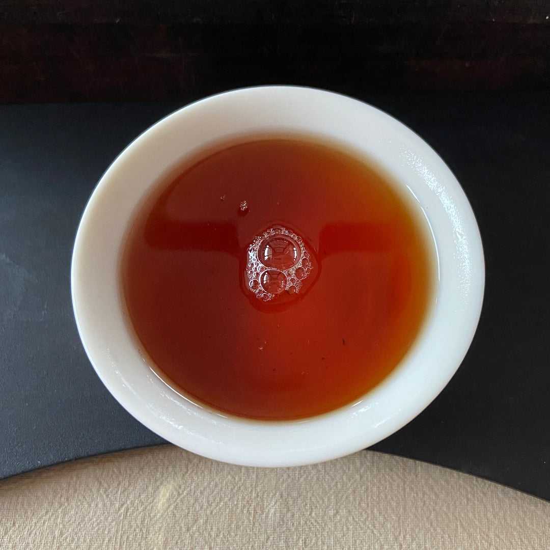 2005 XingHai "Bu Lang - Mei Hua Bing" (Bulang - Plum Flower Cake) 357g Puerh Raw Tea Sheng Cha