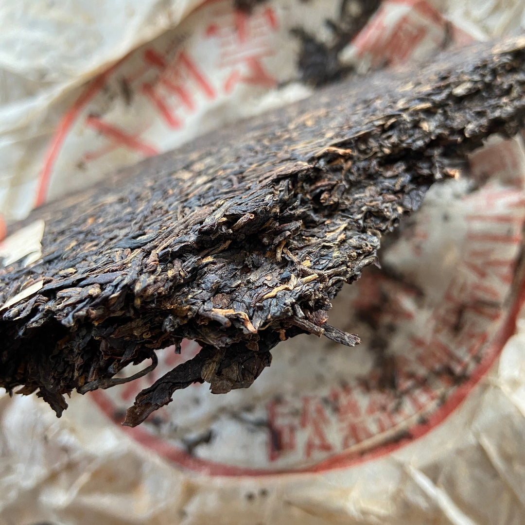 2001 XiaGuan "8653" Iron Cake 357g Puerh Raw Tea Sheng Cha