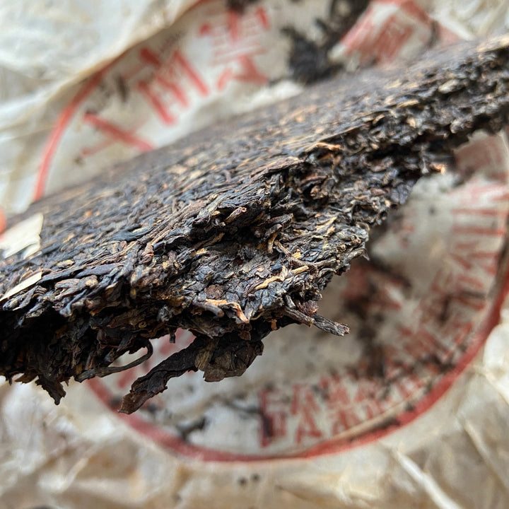 2001 XiaGuan "8653" Iron Cake 357g Puerh Raw Tea Sheng Cha