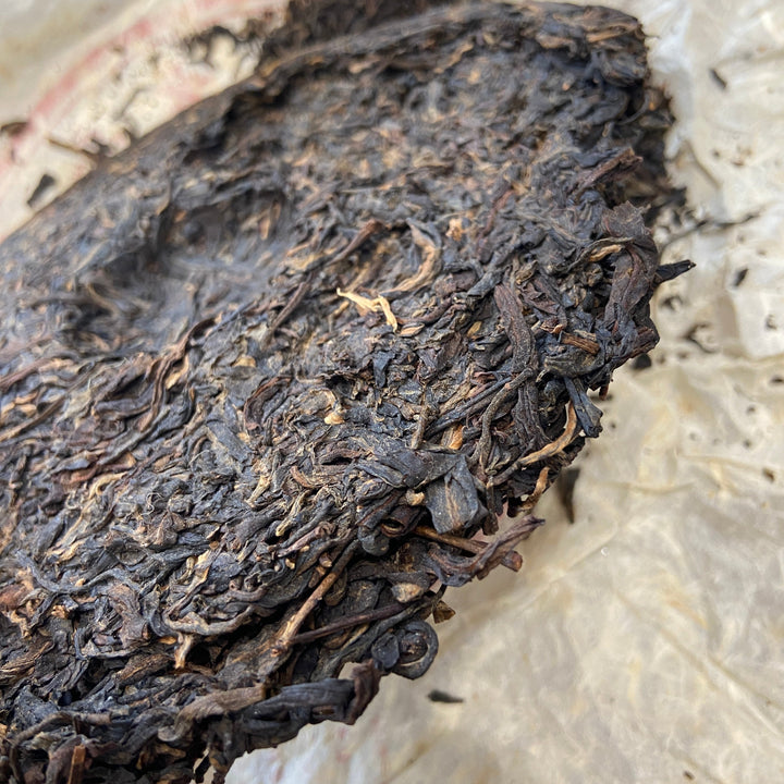 2004 LiMing "Cha Wang - Qiao Mu Ye Sheng - Ban Zhang & Bu Lang & Nan Nuo" (King Tea - Arbor Wild - Banzhang & Bulang & Nannuo) Cake 400g Puerh Sheng Cha Raw Tea