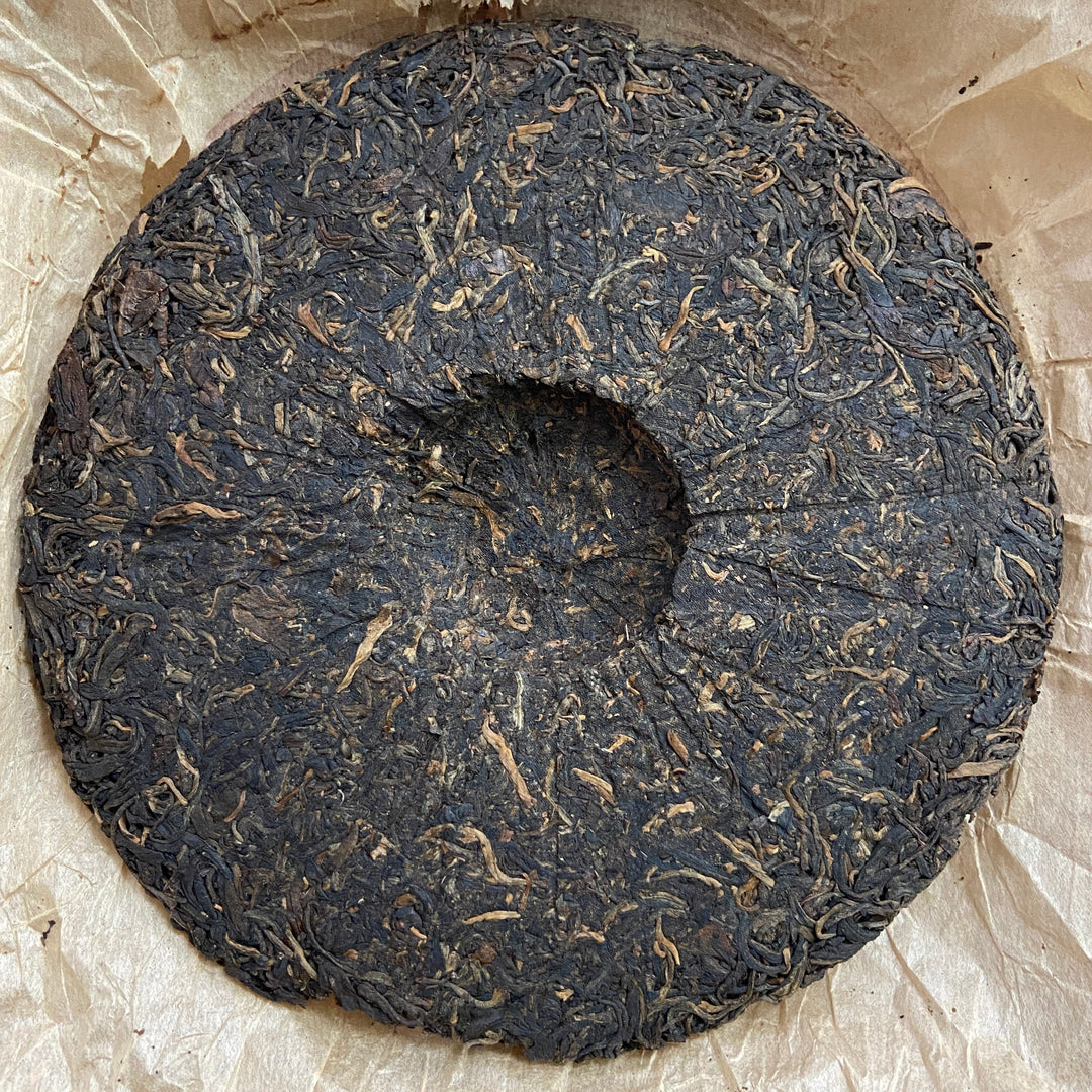 2005 LaoManEr "Yue Jiu Yue Chun - Ban Zhang - Zao Chun Jin Ya" (The Older The Better - Banzhang - Early Spring Golden Bud) 357g Puerh Sheng Cha Raw Tea