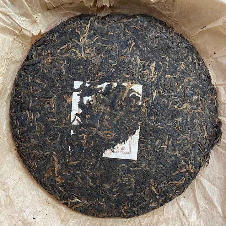 2005 LaoManEr "Yue Jiu Yue Chun - Ban Zhang - Zao Chun Jin Ya" (The Older The Better - Banzhang - Early Spring Golden Bud) 357g Puerh Sheng Cha Raw Tea