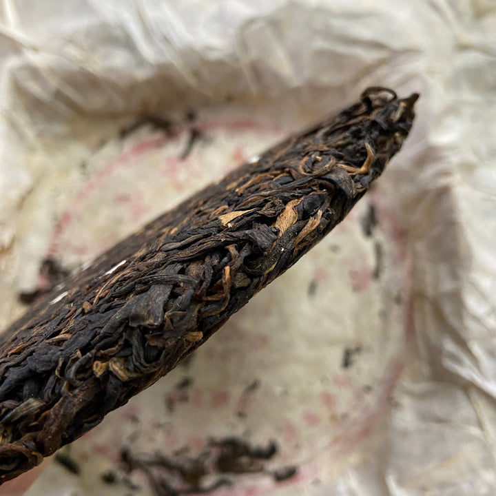 2004 LiMing "Cha Wang - Qiao Mu Ye Sheng - Ban Zhang & Bu Lang & Nan Nuo" (King Tea - Arbor Wild - Banzhang & Bulang & Nannuo) Cake 400g Puerh Sheng Cha Raw Tea