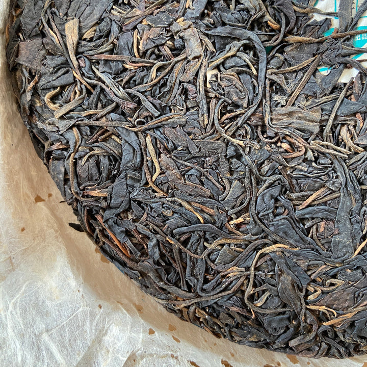 2010 JingLong "Yi Wu Shan Yun- Qiao Mu" (Yiwu Mountain Flavor - Arbor) Cake 357g Puerh Raw Tea Sheng Cha