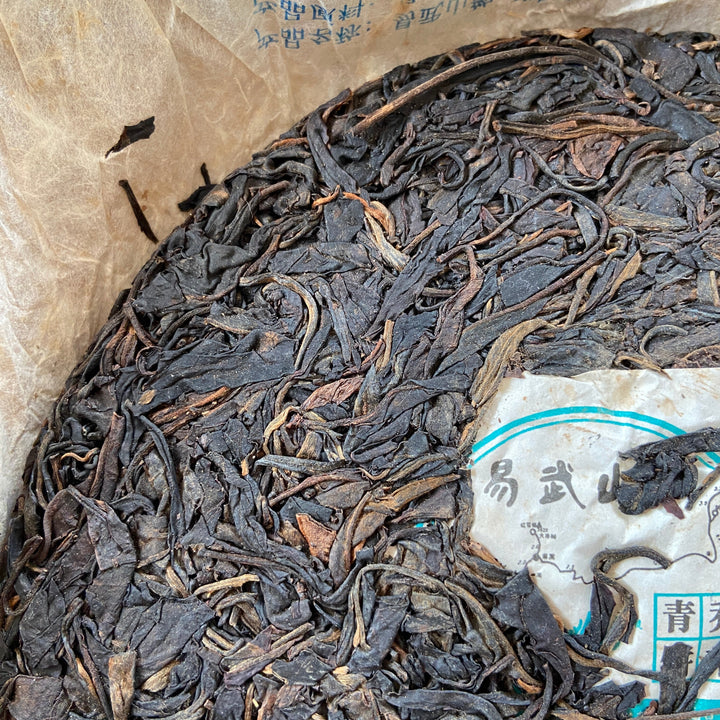 2010 JingLong "Yi Wu Shan Yun- Qiao Mu" (Yiwu Mountain Flavor - Arbor) Cake 357g Puerh Raw Tea Sheng Cha