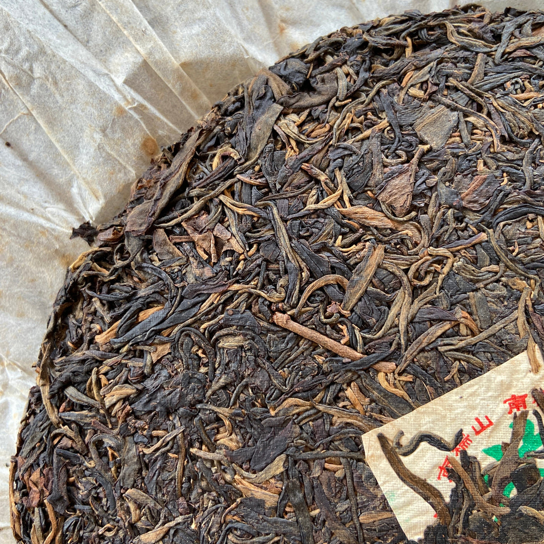 2003 NanNuoShan "Jin Gang- Nan Nuo Shan" (NanNuo Mountain Old Tree) Cake 357g Puerh Raw Tea Sheng Cha