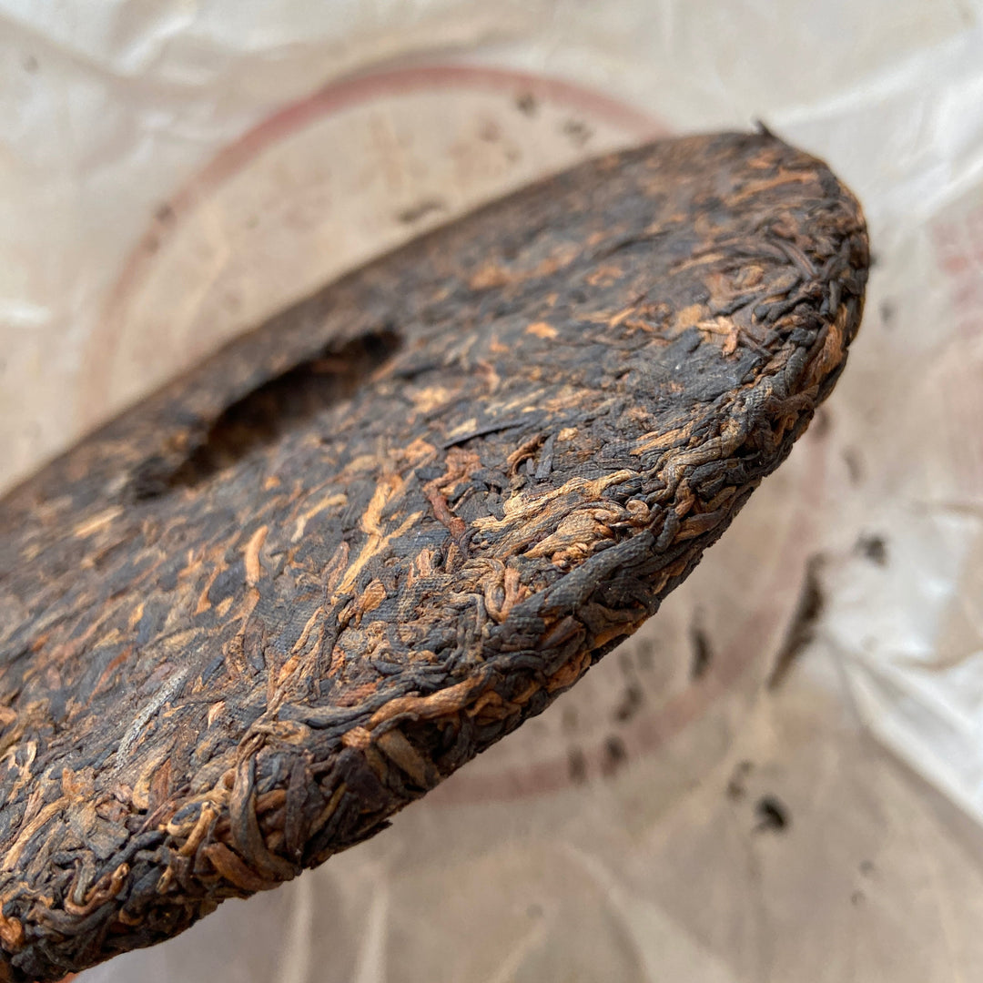 2006 LiMing "Nv Er Gong Bing - Bu Lang Shan - Qiao Mu Old Tree" (Girl's Tribute Cake - Bulang Mountain - Arbor Old Tree) 250g Puerh Ripe Tea Shou Cha