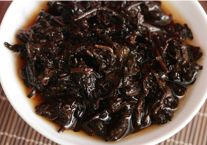 2017 XiaGuan "Dong Fang Zhi Zhu - Bu Lang Gu Shu" (Oriental Pearl - Bulang Old Tree) Iron Cake 357g Puerh Shou Cha Ripe Tea