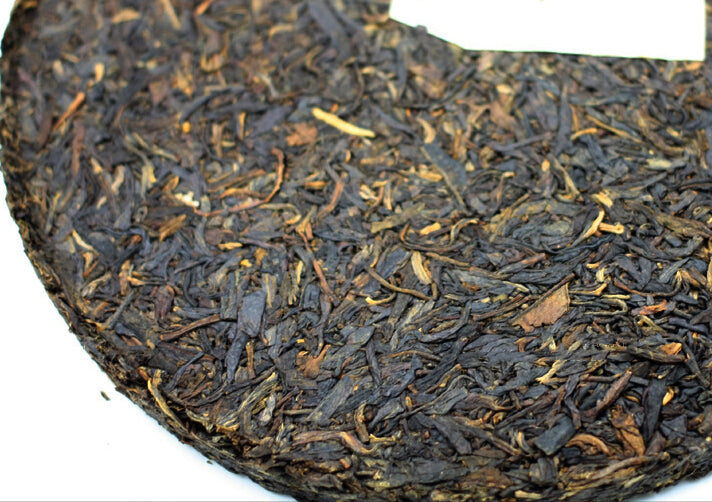2005 XiaGuan "FT8653" Iron Cake 357g Puerh Raw Tea Sheng Cha