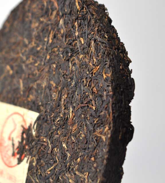 2005 XiaGuan "T8633" Iron Cake 357g Puerh Raw Tea Sheng Cha