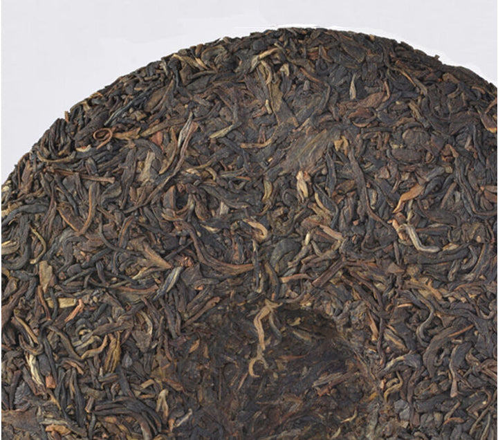 2012 XiaGuan "Ma Hei Yuan Cha- Yi Wu" (Mahei Round Cake- Yiwu) 357g Puerh Sheng Cha Raw Tea