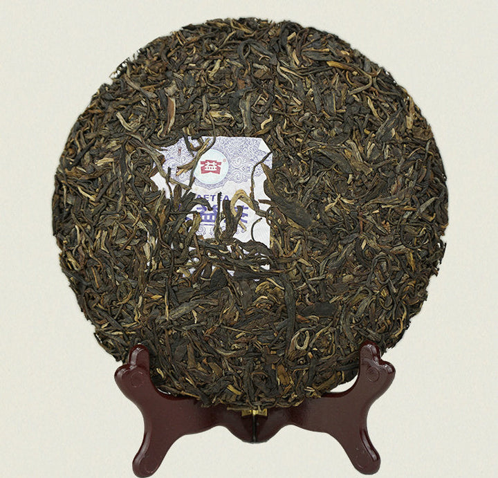 2015 DaYi "Nan Nuo"  (Nannuo Mountain) Cake 357g Puerh Sheng Cha Raw Tea