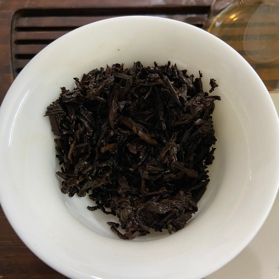 2006 XingHai "Feng - Bu Lang Qiao Mu" (Ballads - Bulang Arbor Tree) Cake 400g Puerh Ripe Tea Shou Cha