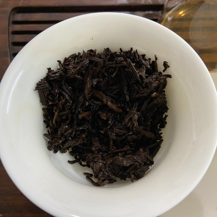 2006 XingHai "Feng - Bu Lang Qiao Mu" (Ballads - Bulang Arbor Tree) Cake 400g Puerh Ripe Tea Shou Cha