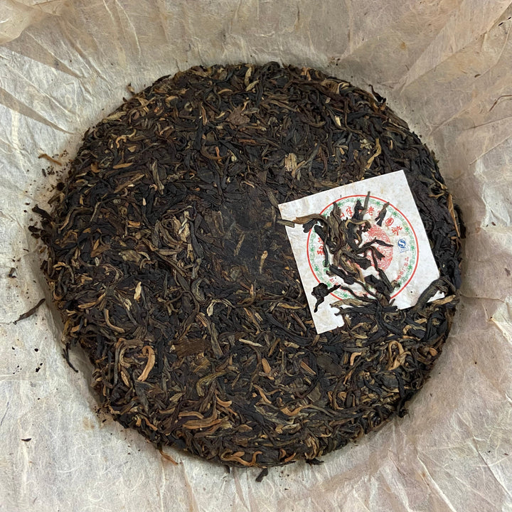 2006 NanQiao ShuangShiHao "Nan Nuo Shan - Ban Po Lao Zhai " (Nannuo Mountain - Banpo Old Village) Cake 357g Puerh Raw Tea Sheng Cha