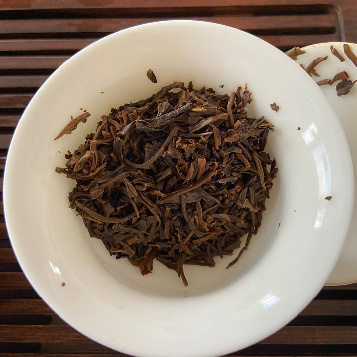 2005 NanQiao "Qiao Mu Ye Sheng - Yin Zhen Gong Bing" (Wild Arbor - Silver Needle Tribute Cake) 250g Puerh Raw Tea Sheng Cha, Meng Hai