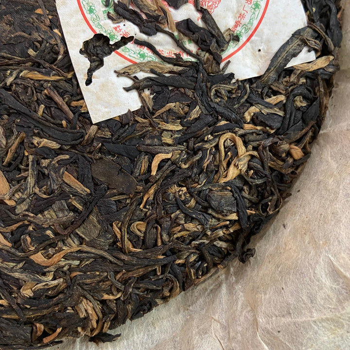 2006 NanQiao ShuangShiHao "Nan Nuo Shan - Ban Po Lao Zhai " (Nannuo Mountain - Banpo Old Village) Cake 357g Puerh Raw Tea Sheng Cha