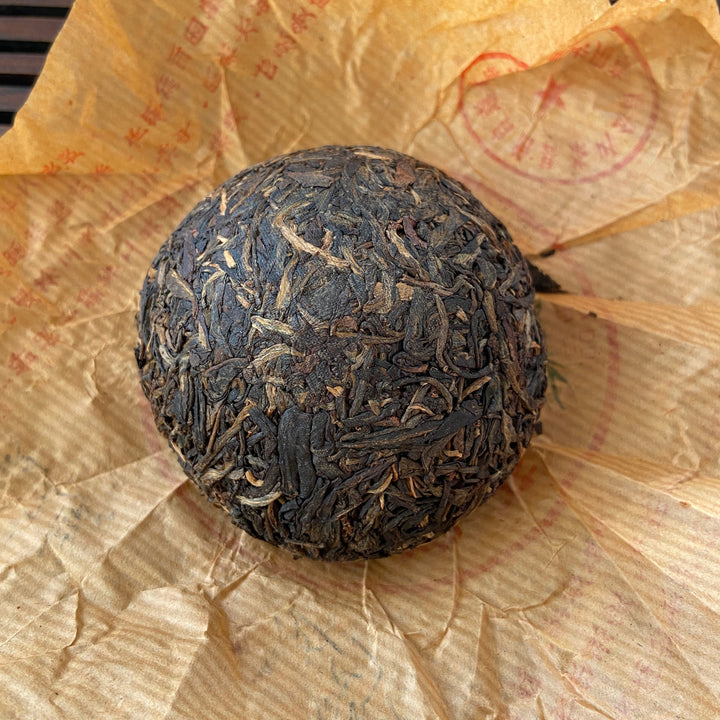 2003 TuLinFengHuang "10 Zhou Nian - Qian Ming " (10th Year’s Commemoration of Recovery- Signed) Tuo 100g Puerh Sheng Cha Raw Tea