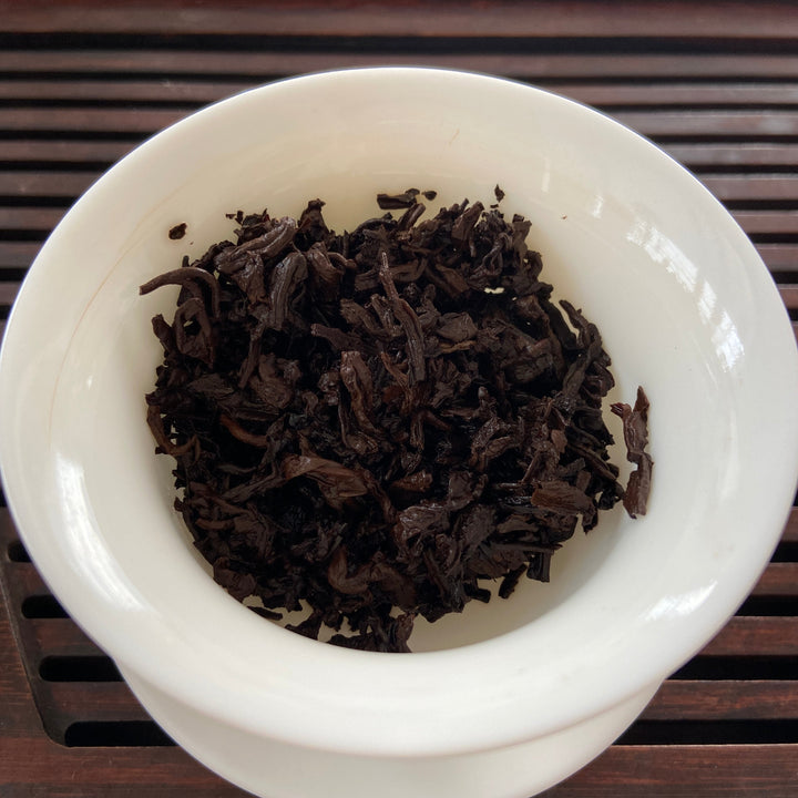 2004 XingHai "Yi Wu" (Yiwu - Old Arbor Tree) Cake 357g Puerh Ripe Tea Shou Cha